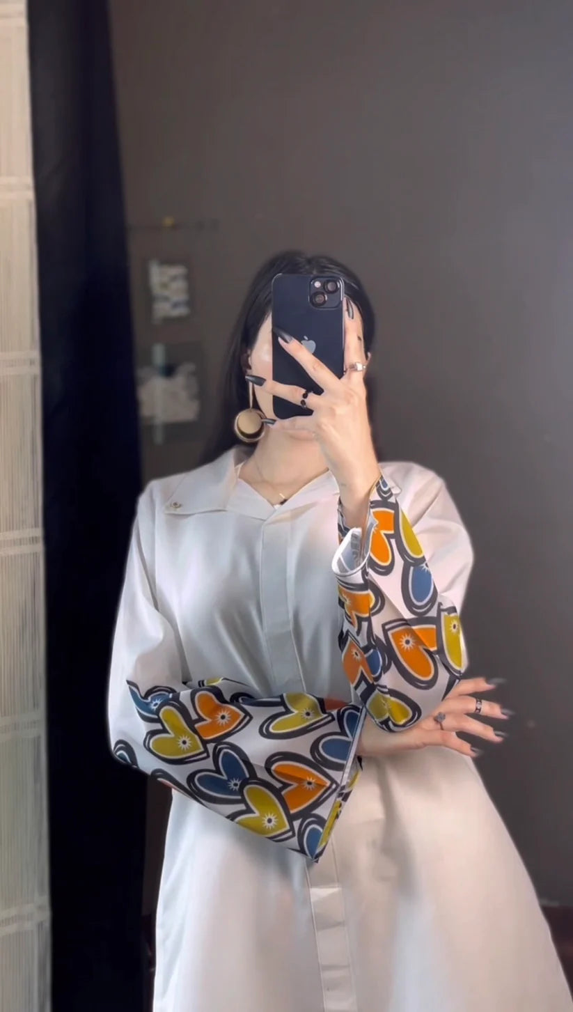 طقم منسق مزين بقلب الزهور